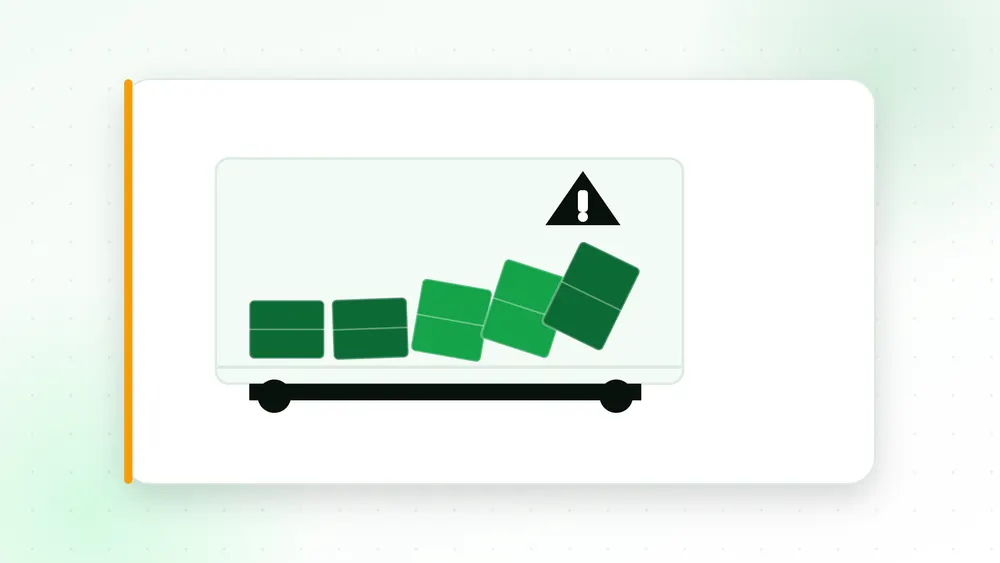 Illustration of pallets tilted and shifted inside a trailer with a warning icon